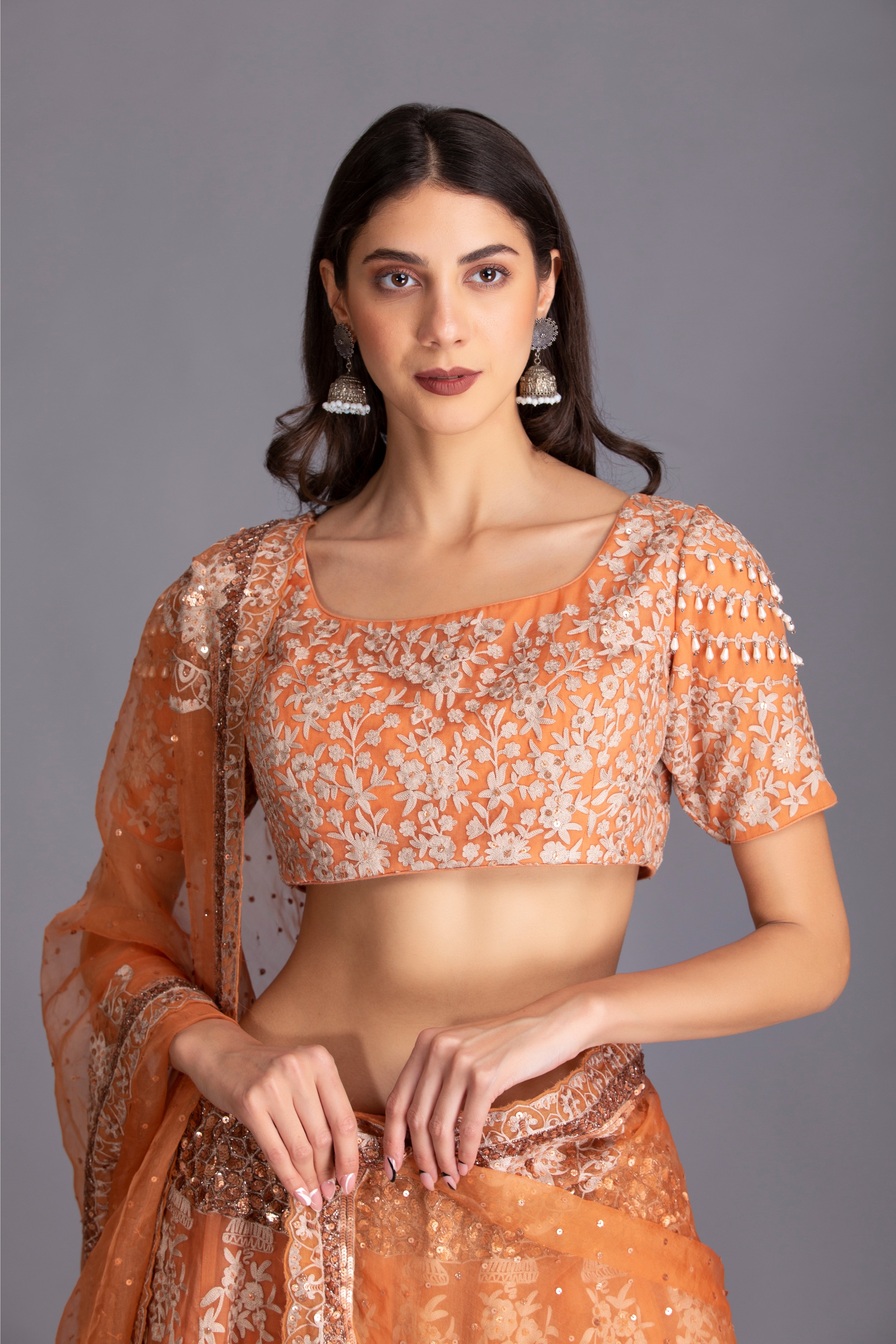 Rust Orange Hand Embroidered Kalidar Lehenga Set